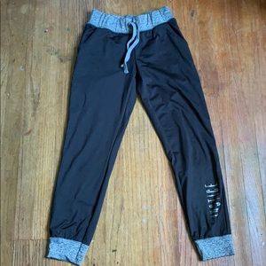 Mosly black top and bottom gray leggings